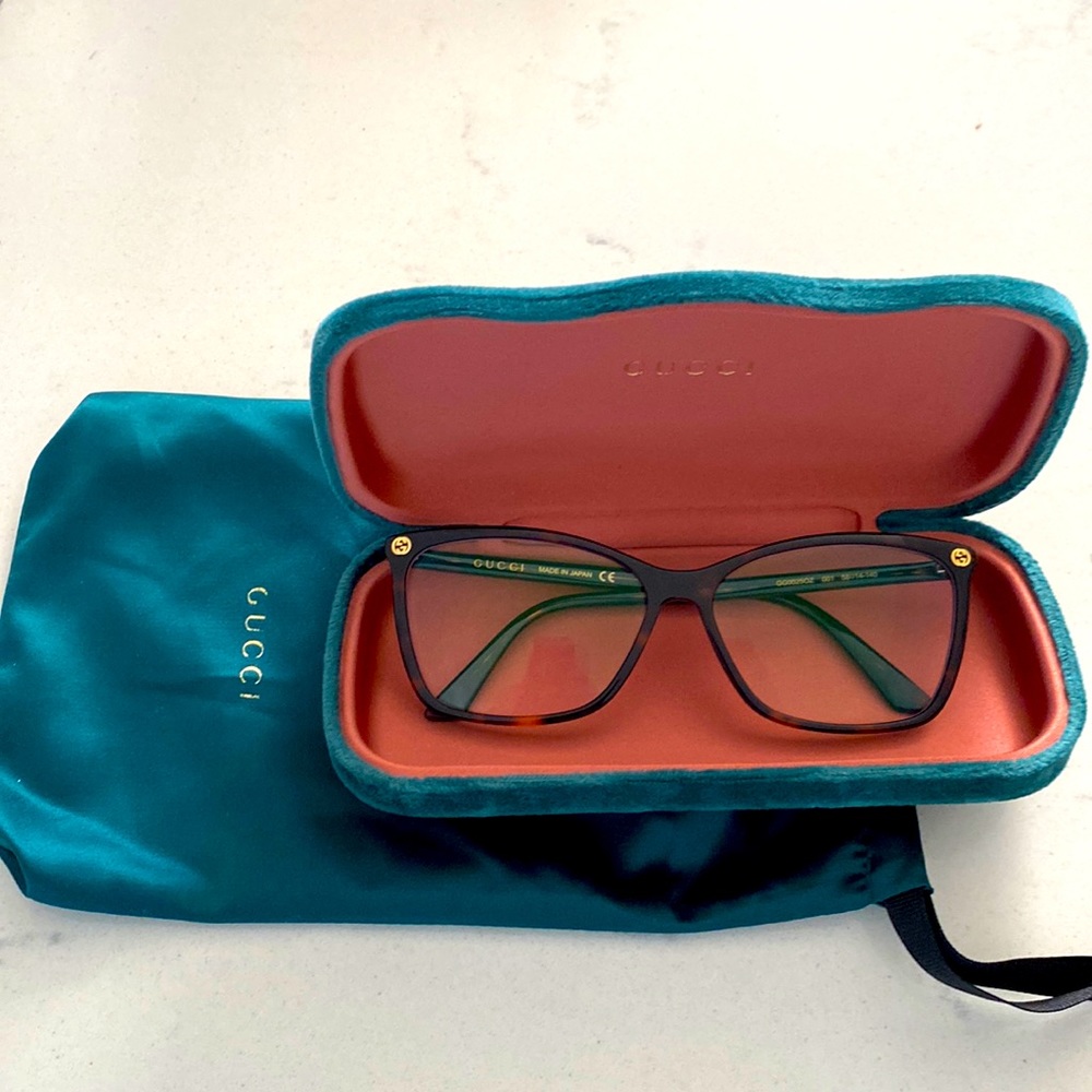 Gucci glasses.